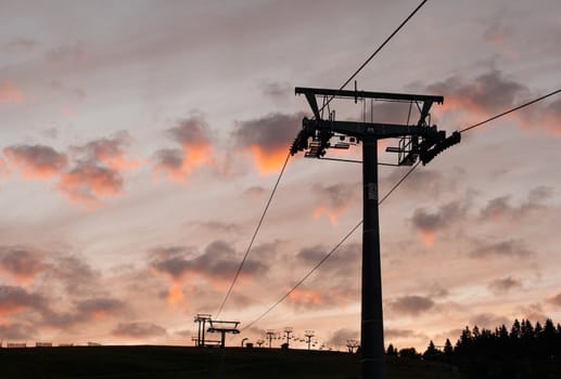 night falls in the mountains with cableway