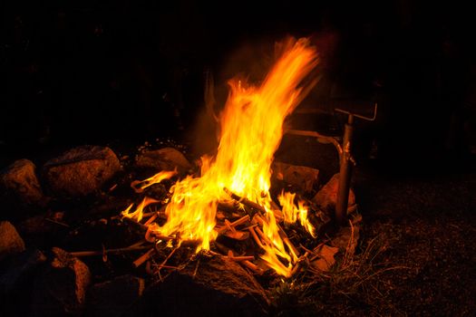 warm and romantic campfire burning torches