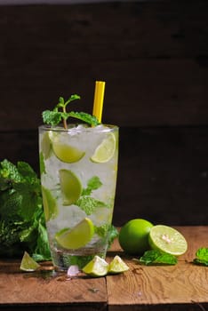 Mojito , lime pieces , leaves of mint with ice and rum