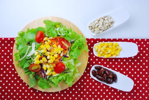 Fresh vegetable salad with corn,carrot,tomato,green oak,red oak,Red bean and millet