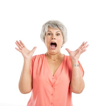 Portrait of a elderly woman surprised with something, isolated on a white background