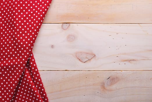 the background made from tablecloth on wooden table