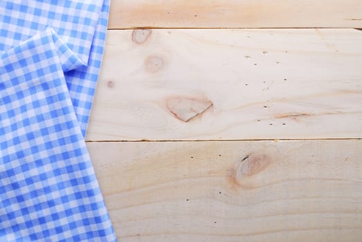 the background made from tablecloth on wooden table