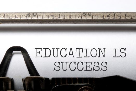Education is success printed on a vintage typewriter 