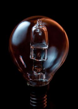 Light bulb on black background