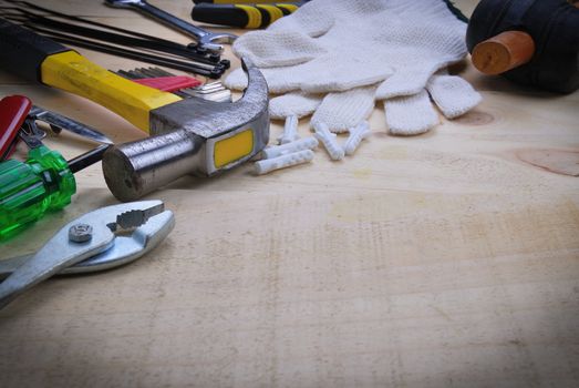 tool renovation on  wood plank table