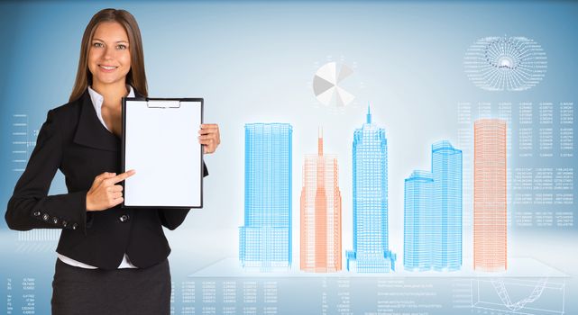Businesswoman holding paper holder. High-tech wire frame skyscrapers and graphs as backdrop