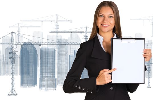 Businesswoman holding paper holder. Wire frame tower crane and skyscrapers as backdrop