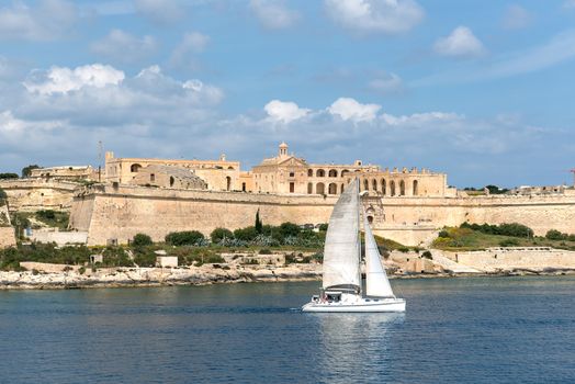 Sailboat on front of Valletta, the Capital City of Malta