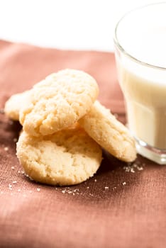 Artistic set: cookies and milk on napkin