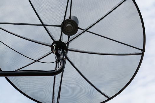 the silhouette close- up of a TV and Internet Satellite dish.