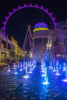 LAS VEGAS - MARCH 15 : The Linq, a dining and shopping district and High Roller at the center of the Las Vegas Strip on March 15 2014 , The High Roller is the world's largest observation wheel