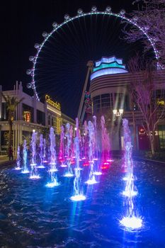 LAS VEGAS - MARCH 15 : The Linq, a dining and shopping district and High Roller at the center of the Las Vegas Strip on March 15 2014 , The High Roller is the world's largest observation wheel