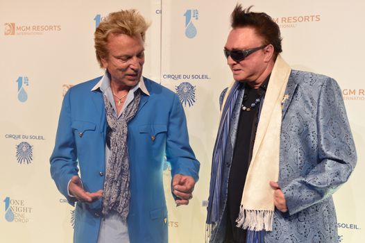 LAS VEGAS - MARCH 21: Former magicians Siegfried (L) and Roy arrives at Cirque du Soleil's annual 'One Night for One Drop' at the Mandalay Bay Resort and Casino on March 21, 2014 in Las Vegas, Nevada