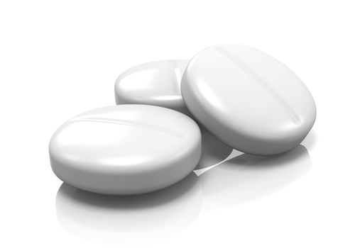 White Tablets with Reflection on White Background