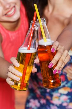 Summer, sea. Cute girls with beer