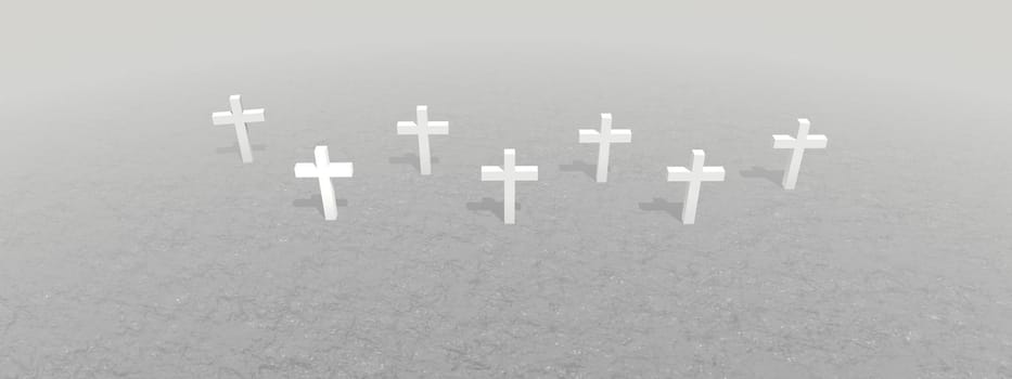 Seven white crosses planted in the ground by snuset