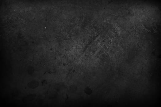 Closeup of dark grunge textured background