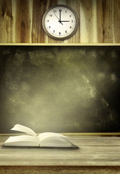 Open book on table in classroom