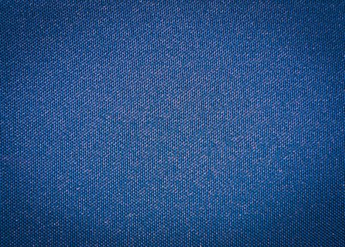 Texture of a blue woven synthetic waterproof fabric