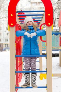 Photo of playing cute girl in winter