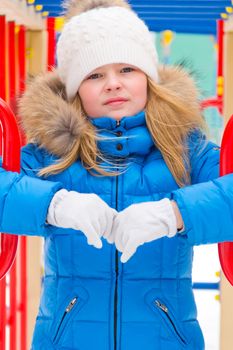 Photo of playing cute girl in winter