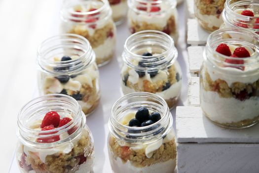 dessert with fresh fruit in containers of glass