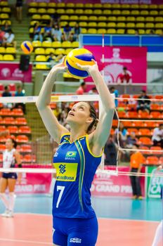 BANGKOK - AUGUST 16: Andreia Sforzin Laurence of Brazil Volleyball Team in action during The Volleyball World Grand Prix 2016 at Indoor Stadium Huamark on August 16, 2014 in Bangkok, Thailand.