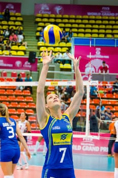 BANGKOK - AUGUST 16: Andreia Sforzin Laurence of Brazil Volleyball Team in action during The Volleyball World Grand Prix 2014 at Indoor Stadium Huamark on August 16, 2014 in Bangkok, Thailand.