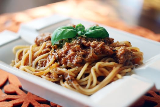 Pasta (bolonese) with tomato sauce and parmesan