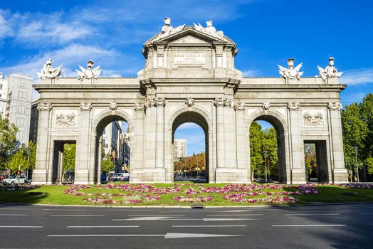 The Puerta de Alcala is a monument in the Plaza de la Independencia ("Independence Square") in Madrid, Spain. It was commissioned by King Carlos III, with construction beginning in 1778. 