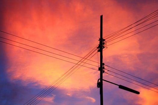 Sunset in Thailand and electricity pole