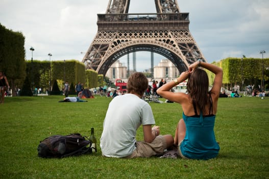 couple in Eiffel Tower in Paris