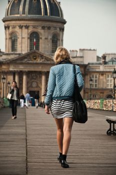 woman in the Arts bridge in Paris