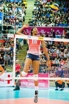 BANGKOK - AUGUST 16: Foluke Akinradewo of USA Volleyball Team in action during The Volleyball World Grand Prix 2014 at Indoor Stadium Huamark on August 16, 2014 in Bangkok, Thailand.