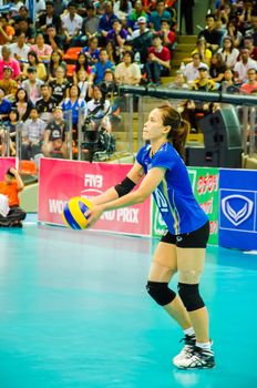 BANGKOK - AUGUST 16: Wilavan Apinyapong of Thailand Volleyball Team in action during The Volleyball World Grand Prix 2014 at Indoor Stadium Huamark on August 16, 2014 in Bangkok, Thailand.