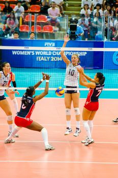 BANGKOK - AUGUST 17: Jordan Quinn Larson Burbach of USA Volleyball Team in action during The Volleyball World Grand Prix 2014 at Indoor Stadium Huamark on August 17, 2014 in Bangkok, Thailand.