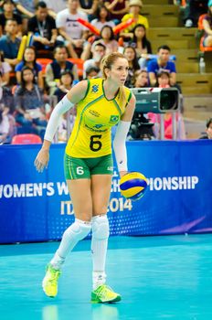 BANGKOK - AUGUST 17: Thaisa Menezes of Brazil Volleyball Team in action during The Volleyball World Grand Prix 2014 at Indoor Stadium Huamark on August 17, 2014 in Bangkok, Thailand.