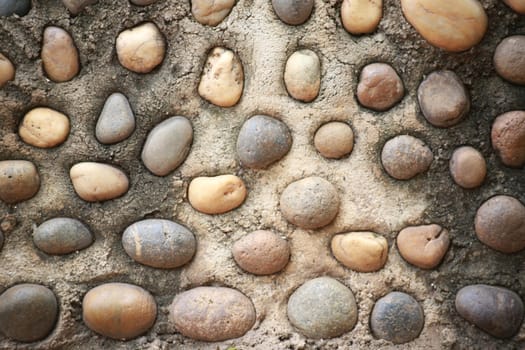 The rocks in circle and eag-shape are decoration on the wall.