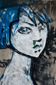 urban art street in paris - woman face