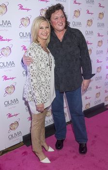 LAS VEGAS, - APRIL 11: Entertainer Olivia Newton-John (L) and actress Dot Jones attends the grand opening of her residency show 'Summer Nights' at Flamingo Las Vegas on April 11, 2014