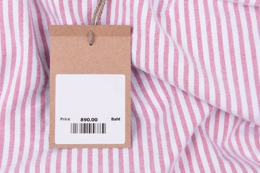 price tag with barcode on a shirt