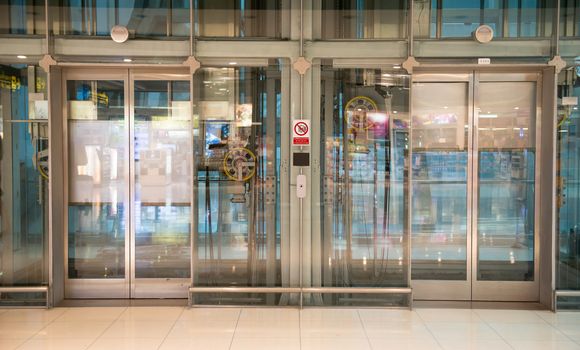 transparent airport elevator with no people inside