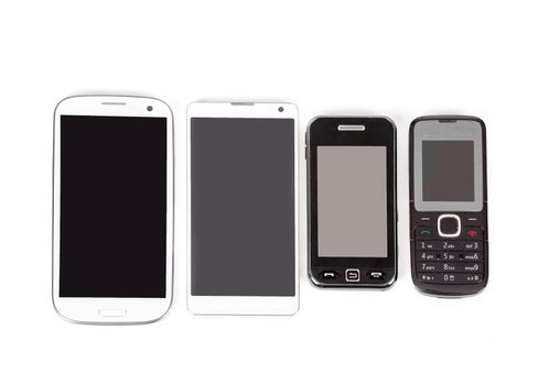 collection of cell phones, old design and new smart phones isolated on white