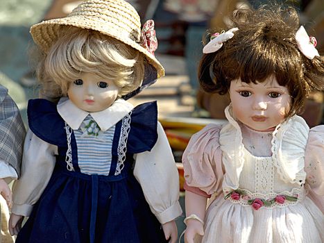 Old dolls for sale at antiques fair     