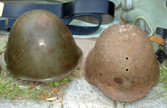 Military helmets exhibited at the fair for sale       