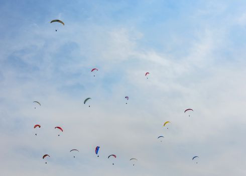 Paragliders flying in the sky