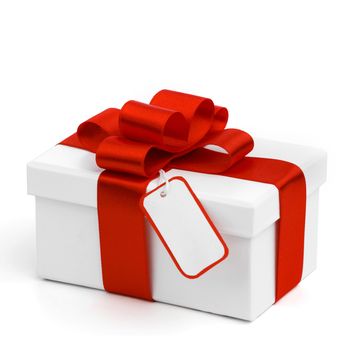 Holiday gift in white box with red bow and tag isolated on white background