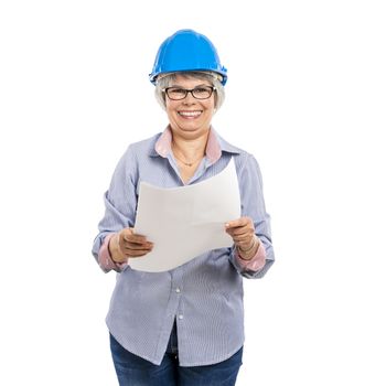 Female architect with a helmet and holding paper projects