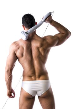 Bakc of Sexy Muscular Man in White Brief Holding Massage Device, Isolated in White Background
